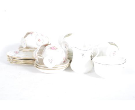 2 early 20th century Staffordshire part tea services to include Queen Anne silver banded tea set together with a Royal Kent c