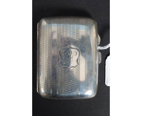 A silver hallmarked cigarette case with chase decorated design, central cartouche with monogram having Birmingham hallmarks f