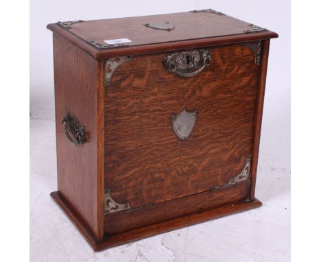 An excellent Edwardian oak and white metal desk top stationary writing slope box. The fall front panel with leather lined wri