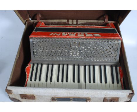 A vintage Soprani orange and cream faux marble accordion, with case. 