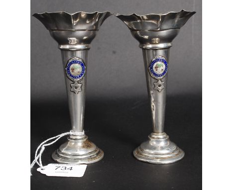 A pair of silver hallmarked fluted stem vases bearing enamel painted masonic badges for The Polytechnic Lodge 1928. Hallmarks