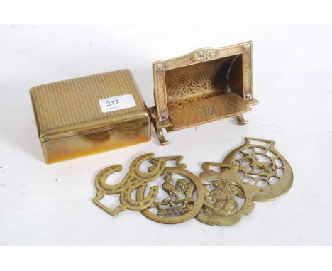 METALWARES; A collection of metalwares to include an early 20th century brass vesta matchstrike in the form of a Valent firep