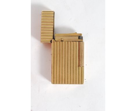 A good 20th century S.T.Dupont lighter 20u Paris being gold plated having numbers BBDH92 serial number.