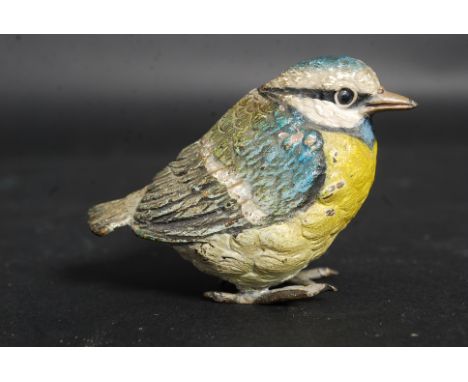 A 20th century unmarked bronze cold painted figure of a blue tit bird.