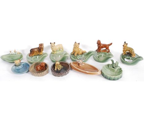WADE: A collection of 11x Wade novelty ashtrays etc, each with animals to top.

NOTE: from a large and private collection of 