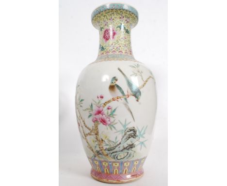 A Chinese famille rose vase of bulbous form having famille juane enamel painted neck with scenes of birds and floral sprays. 