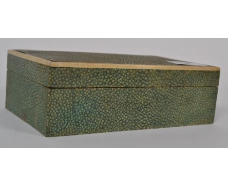 A vintage 20th century Shagreen manta ray skin table top cigarette box. The wooden box being covered in shagreen