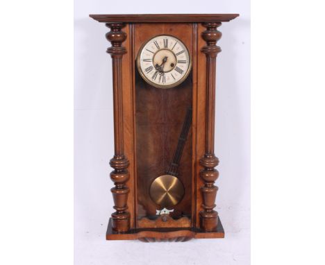 A large 19th century walnut Viennese regulator wall clock in the manner of Gustav Becker. The enamel face unsigned. Good case