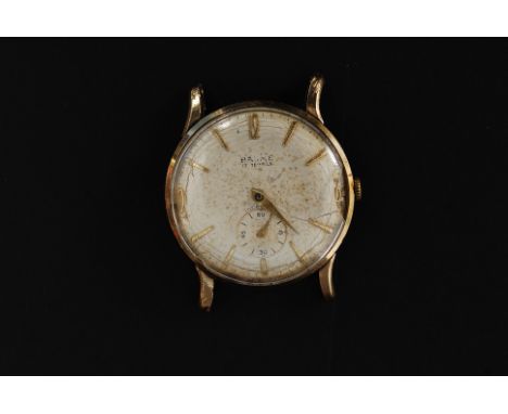 A Baume 9ct gold gentlemans wristwatch having numbers and batons to the chapter ring, subsiduary seconds dial to lower centre