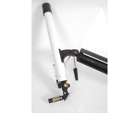 A 20th century telescope in white complete with tripod