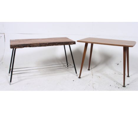 A 1950's walnut coffee table raised on tapered legs together with a trunk planked coffee table raised on metal supports.  H40