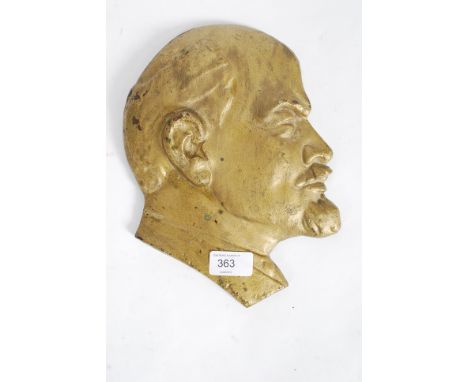An unusual 20th century bronze / cast metal wall plaque in the form of Vladimir Lenin in profile. 26cm tall.