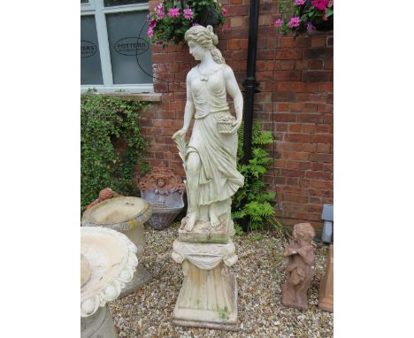 Hi Density plastic Garden Statue which measures approx 44 inches tall which stands on a Stone plinth which measures 24 inches