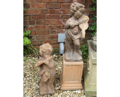 Two Terracotta Musical Nymphs. One raised on plinth.  Each measures approx 24 inches tall. Plinth measures 15 inches tall.  T