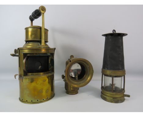 Mixed lot to include a brass shipping lantern and Lucas lamp both require need glass, plus a antique miners lamp.