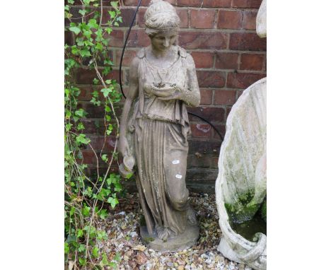 Large Reconstitued Stone Garden Ornament which measures approx 40 inches tall. THIS ITEM IS TOO HEAVY TO POST AND IS FOR COUR