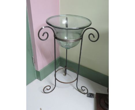 Inverted Bell Cloch Glass Planter on wrought metal stand. Total height 29 inches by 15 inches. See photos. 