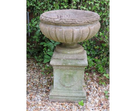 Weathered Reconstitued Stone Garden Urn which measures approx 30 x 19 inches. Comes in Three Pieces. THIS ITEM IS TOO HEAVY T