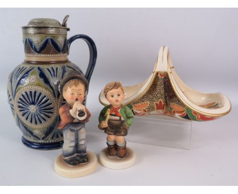 Mixed ceramics including Hummel figurines, antique Copeland basket and a Doulton style lidded vessel.