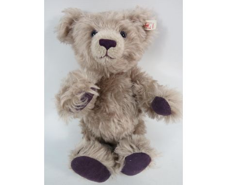 Limited Edition Lilac and Purple Steiff bear, 1928 of 3000.