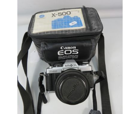 Minolta X500 camera and a Cannon camera bag.