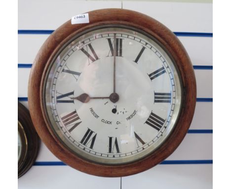 A.Brown and son ltd vintage mahogany circular wall clock in runnung order, 15.5" diameter.