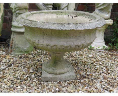 Reconstituted Weathered Stone Planter which measures approx 18 x 26 inches. THIS ITEM IS TOO HEAVY TO POST AND IS FOR COURIER