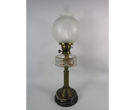 Vintage Oil lamp with brass column, marble base, clear glass reserve and frosted glass globe shade. 26.5" tall from base to t