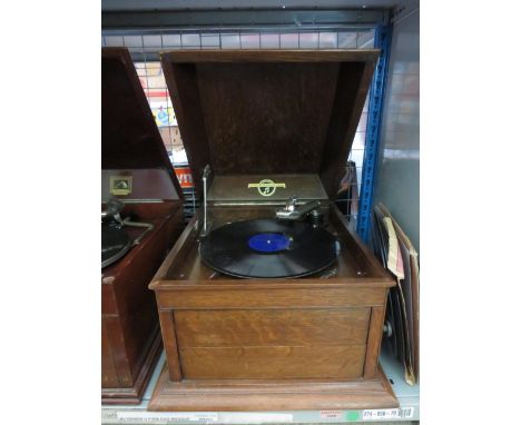 Columbia model no 117a gramophone in working condition and a selection of records.
