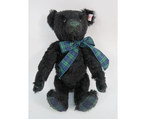 Steiff Limited Edition black musical bear 1034 0f 2000, approx 12" long.