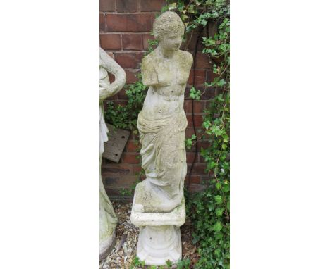 Venus Style Reconstituted weathered stone statue on plinth. Measures approx 47 inches tall. Slight damage to one corner. THIS
