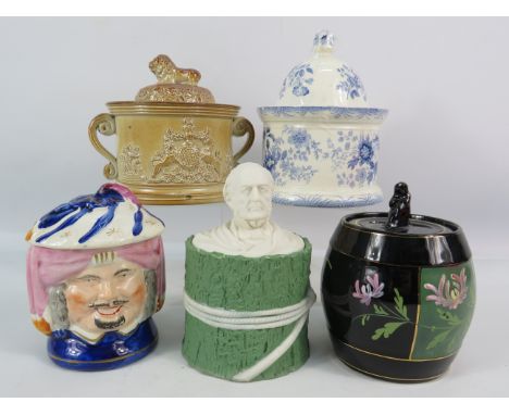 Six various vintage lidded tobbacco jars.