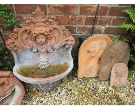 Terracotta wall mounted water feature, Decorative Wall Plates plus one water feature with damage . See photos. THIS ITEM IS T