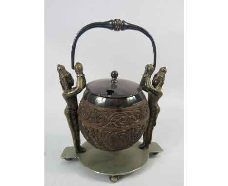 P.Orr and Sons silver plated Indian tea caddy with carved wood bowl, and brass figurines. Approx 8.5" tall with handle raised