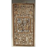 AN EARLY CHINESE CARVED AND PIERCED PANEL, with central relief panel carved with figures on