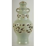 A CHINESE RU STYLE CELADON GLAZED TWIN HANDLE CENSER, 21cm high.