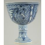 A CHINESE BLUE AND WHITE PORCELAIN STEM CUP, 9cm high.