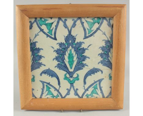 A FINE 16TH-17TH CENTURY IZNIK STYLE OTTOMAN DAMASCUS TILE, framed, tile 25cm square.