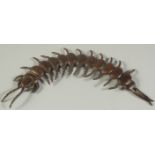 AN ARTICULATED BRONZE OKIMONO OF A CENTIPEDE, 15.5cm long.