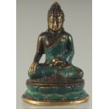 A SMALL TIBETAN GILT BRONZE BUDDHA, 7cm high.