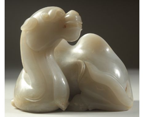 A VERY FINE AND LARGE CHINESE CARVED JADE SEATED CAMEL, base 14cm x 10cm, 12cm high.