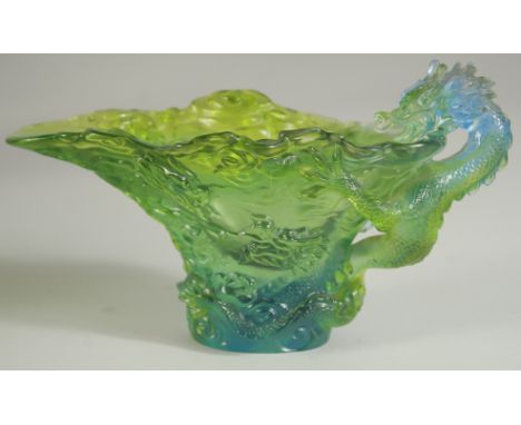 A LIULI GONG FANG GLASS DRAGON CUP, inscribed to the base, serial no. 1067/1200, 17cm long.