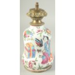 A CHINESE FAMILLE ROSE PORCELAIN LAMP, painted with figures, precious objects, butterflies,