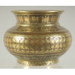 A 19TH CENTURY TIBETAN GILT BRONZE CENSER, 9cm diameter.
