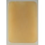 A CHINESE YELLOW JADE RECTANGULAR PENDANT, 5cm x 3.5cm.