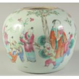 A CHINESE FAMILLE ROSE PORCELAIN JAR AND HARDWOOD COVER, painted with figures, 22cm high overall.