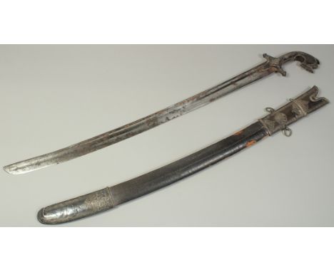 A RARE EARLY 19TH CENTURY ARAB YEMENI SILVER MOUNTED SWORD, with leather overlaid wooden scabbard, 90cm long overall.