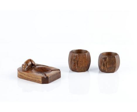 Robert Thompson of Kilburn (1876-1955)  Pair of Mouseman napkin rings and an ashtray oak each with carved mouse signature ash