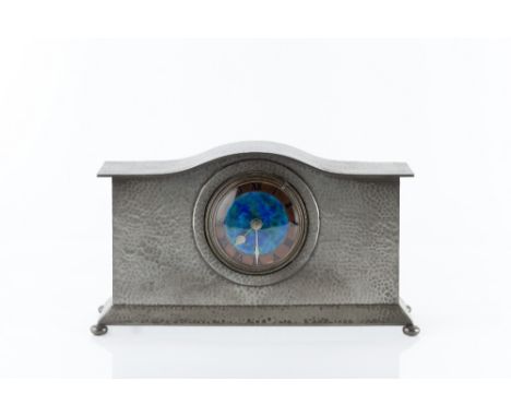 Liberty &amp; Co. Mantel clock, model no.01126 hammered pewter case with enamel dial stamped manufacturer's marks 17.7cm high
