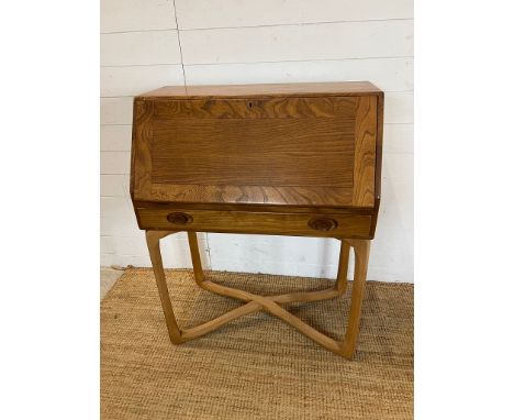 An 1960's Ercol writing desk (H103cm W80cm D45cm)